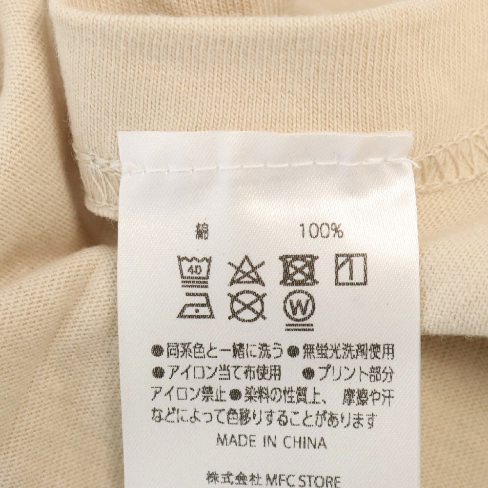 MFC STORE(エムエフシーストア) × 炎炎ノ消防隊 アイリス ラートム 半袖Tシャツ ベージュ MFC21S-TP-0123