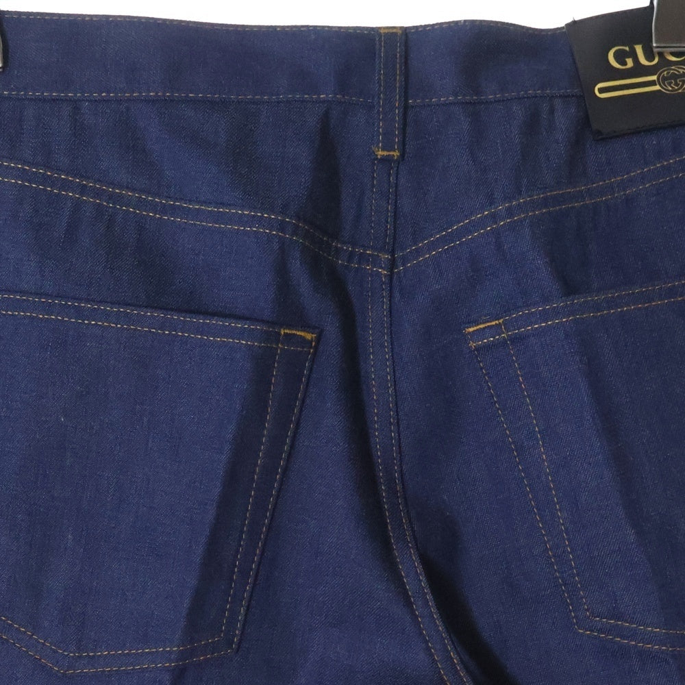 GUCCI(グッチ) ロゴパッチ ブーツカットパンツ 634135 XDA93 インディゴ