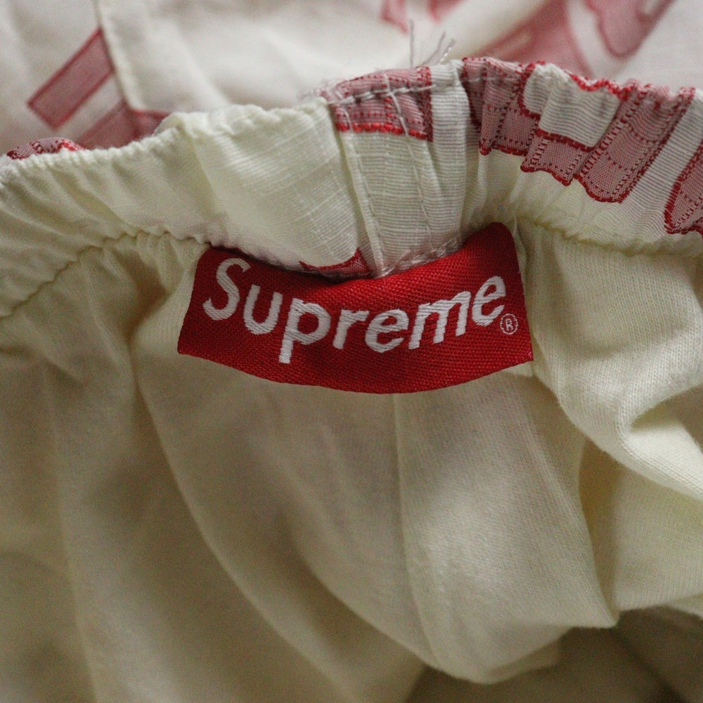 SUPREME(シュプリーム) 21AW Logo Ripstop Track Pant ロゴ リップストップ トラックナイロンパンツ レッド/アイボリー