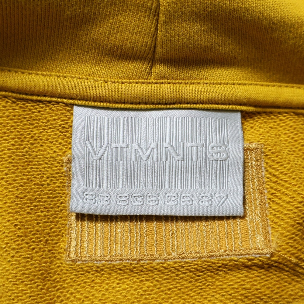 VTMNTS(ブイティーエムエヌティーエス) カレッジロゴ刺繍 プルオーバーパーカー スウェット イエロー VL16HD380M