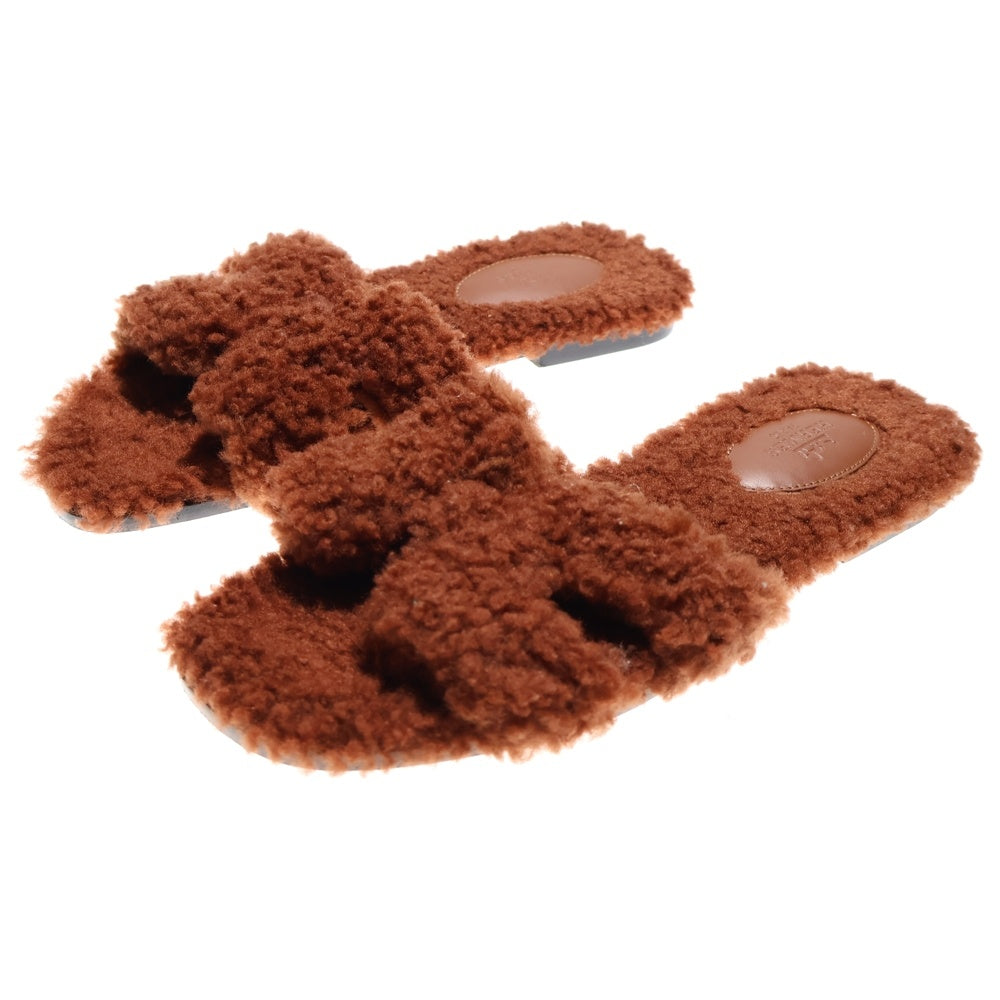 HERMES(エルメス) オラン ボア ムートン Hモチーフ フラット サンダル ミュール ブラウン