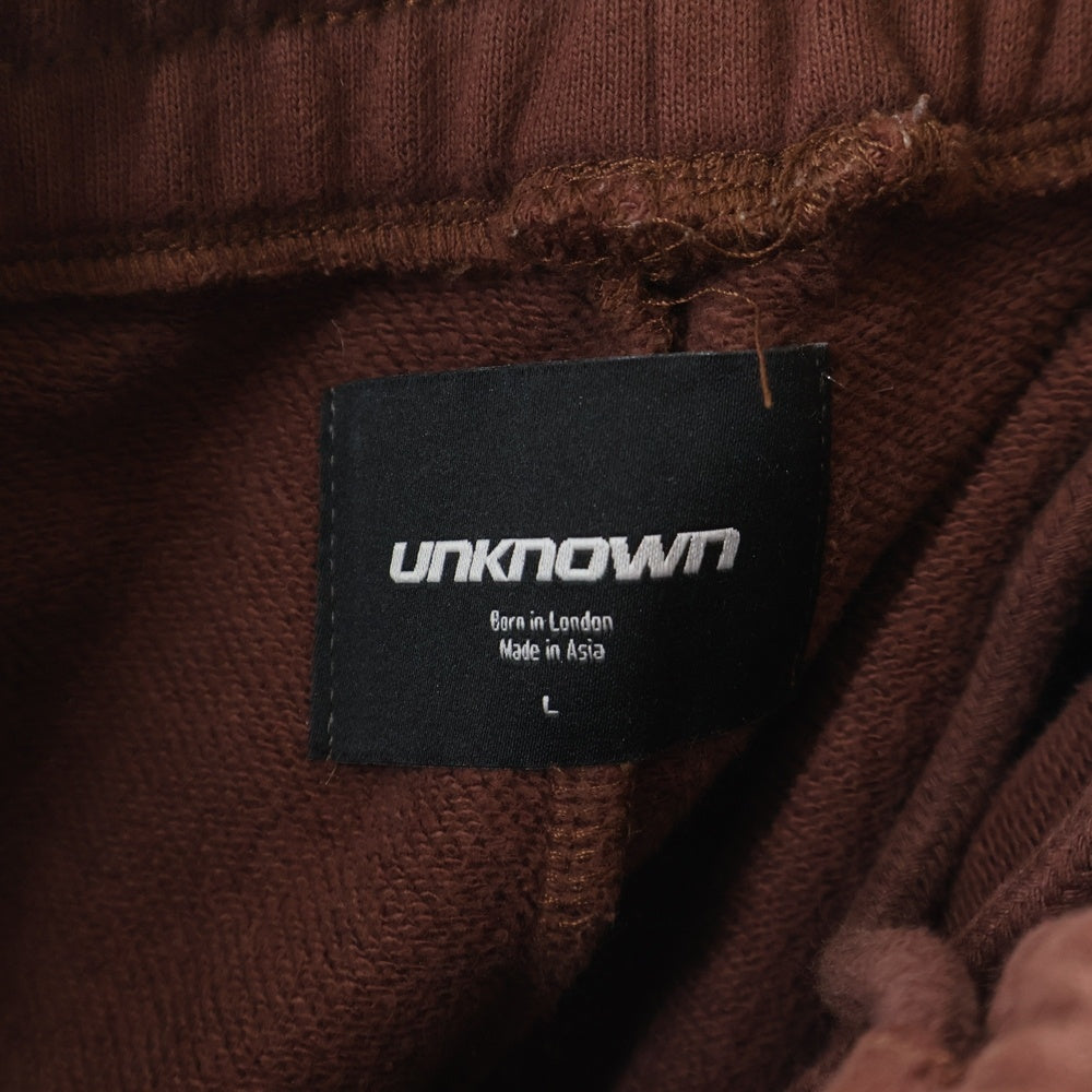 UNKNOWN LONDON(アンノーンロンドン) クロスモチーフ ラインストーン スウェットパンツ ブラウン