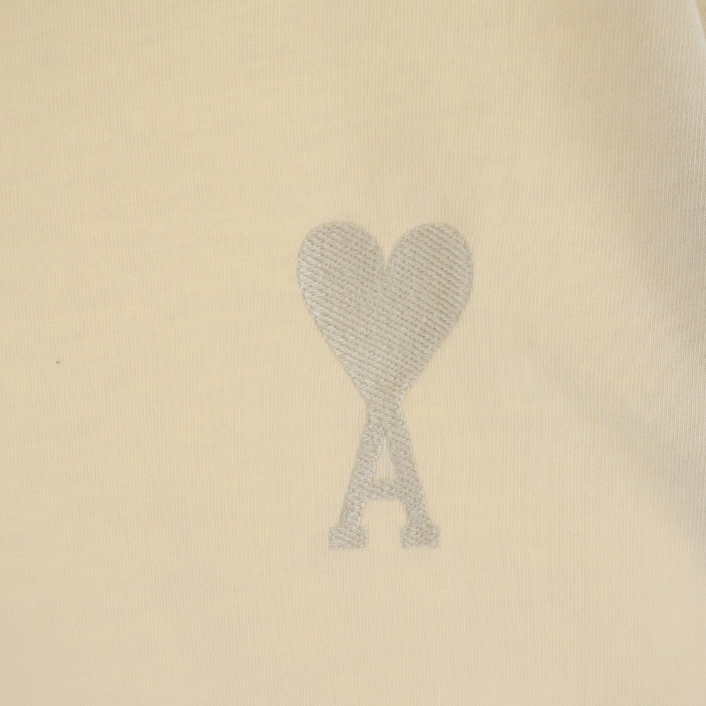 AMI Alexandre Mattiussi(アミアレクサンドルマテュッシ) T-Shirt ハートロゴ刺繍 半袖Tシャツ アイボリー UTS002.726 UTS002.726
