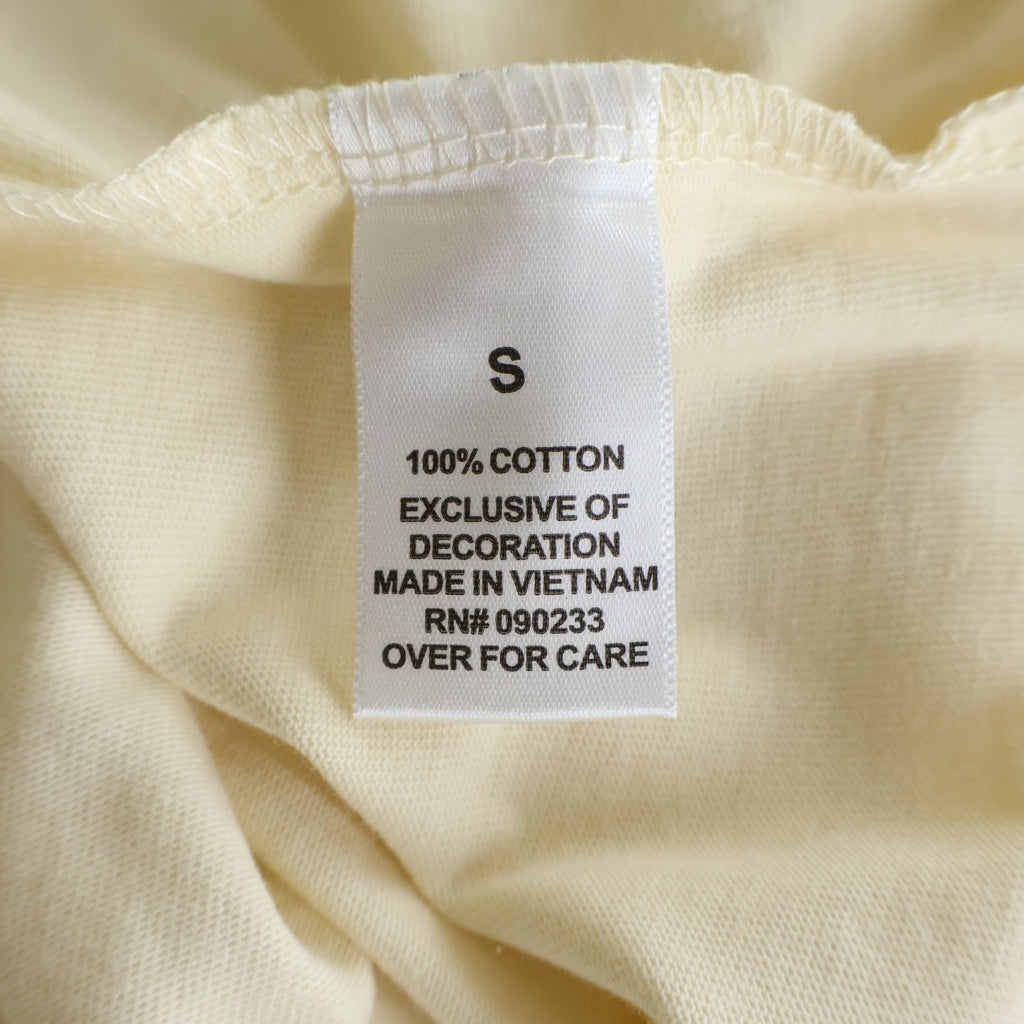 FEAR OF GOD ESSENTIALS(フィアオブゴッド エッセンシャルズ) S/S T-SHIRT バックラバーロゴ 半袖Tシャツ アイボリー