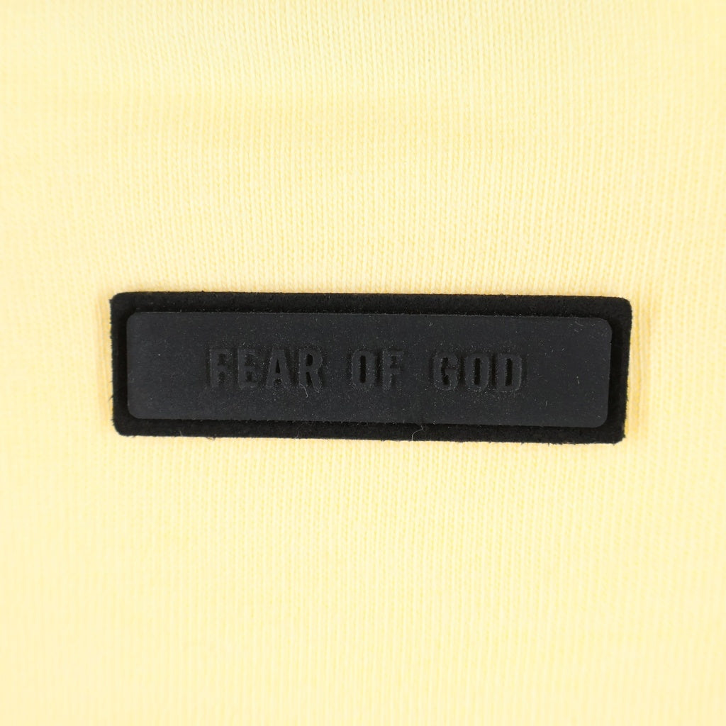 FEAR OF GOD ESSENTIALS(フィアオブゴッド エッセンシャルズ) HEAVY L/S T-SHIRT ラバーロゴ ヘビーオンス長袖Tシャツ ロンT イエロー