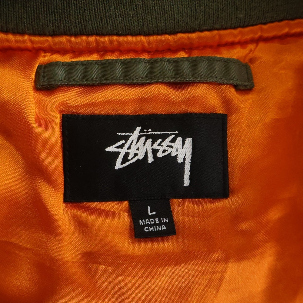 STUSSY(ステューシー) ×CDG MA-1 Jacket 40周年記念 コムデギャルソン コラボ ジャケット カーキ