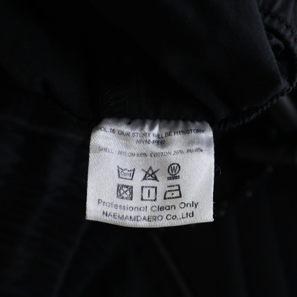 99%is(ナインティナインパーセントイズ) VOL.16 NN18-PT11 ZIP NYLON PANTS ジップデザイン ナイロンラバーロゴパンツ ブラック