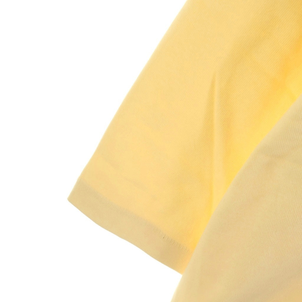 FEAR OF GOD ESSENTIALS(フィアオブゴッド エッセンシャルズ) V NECK JERSEY ラバーロゴ Vネック ヘビーオンス半袖Tシャツ イエロー