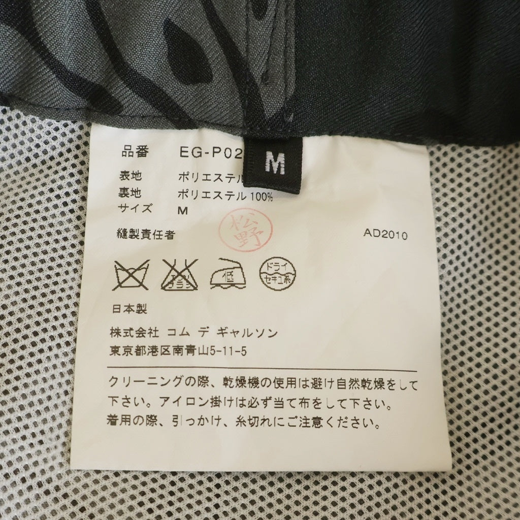 COMME des GARCONS HOMME PLUS(コムデギャルソンオムプリュス) 11SS ドローコード テーパード パンツ ハイビスカス柄 ダークグリーン EG-P024