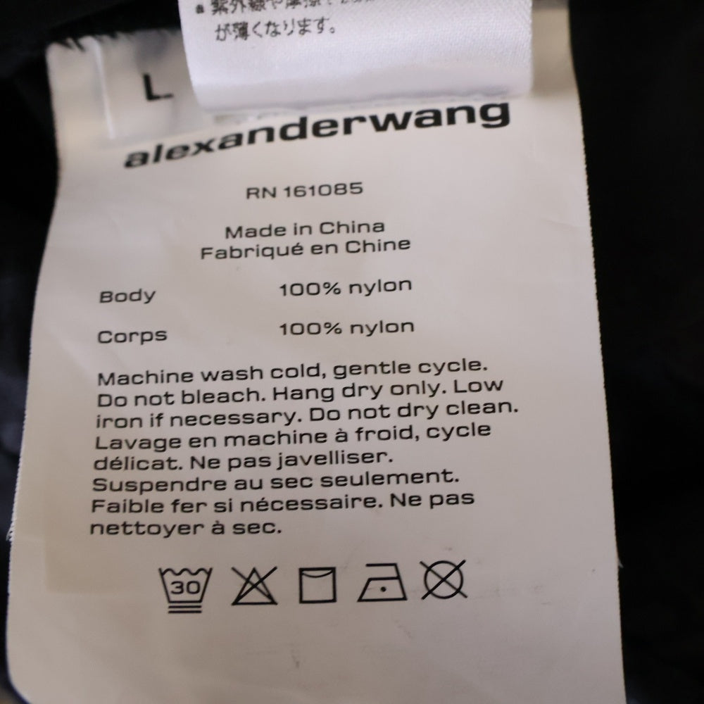 ALEXANDER WANG(アレキサンダーワン) 総柄ロゴ ナイロンハーフジップアップ ブルゾン ブラック UWC123202