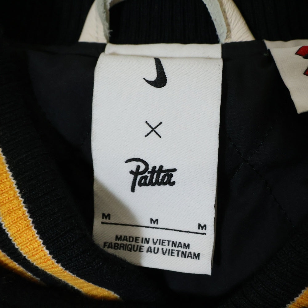 NIKE(ナイキ) ×PATTA VARSITY JACKET パタ バーシティジャケット スタジャン FJ3107-010 ブラック/ホワイト/イエロー
