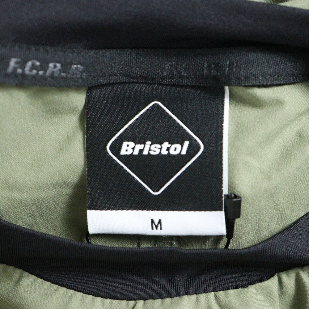 F.C.R.B.(エフシーアールビー) 23SS STRETCH LIGHT WEIGHT PISTE ストレッチライトウェイト プルオーバーシャツ カーキ/ブラック FCRB-230039