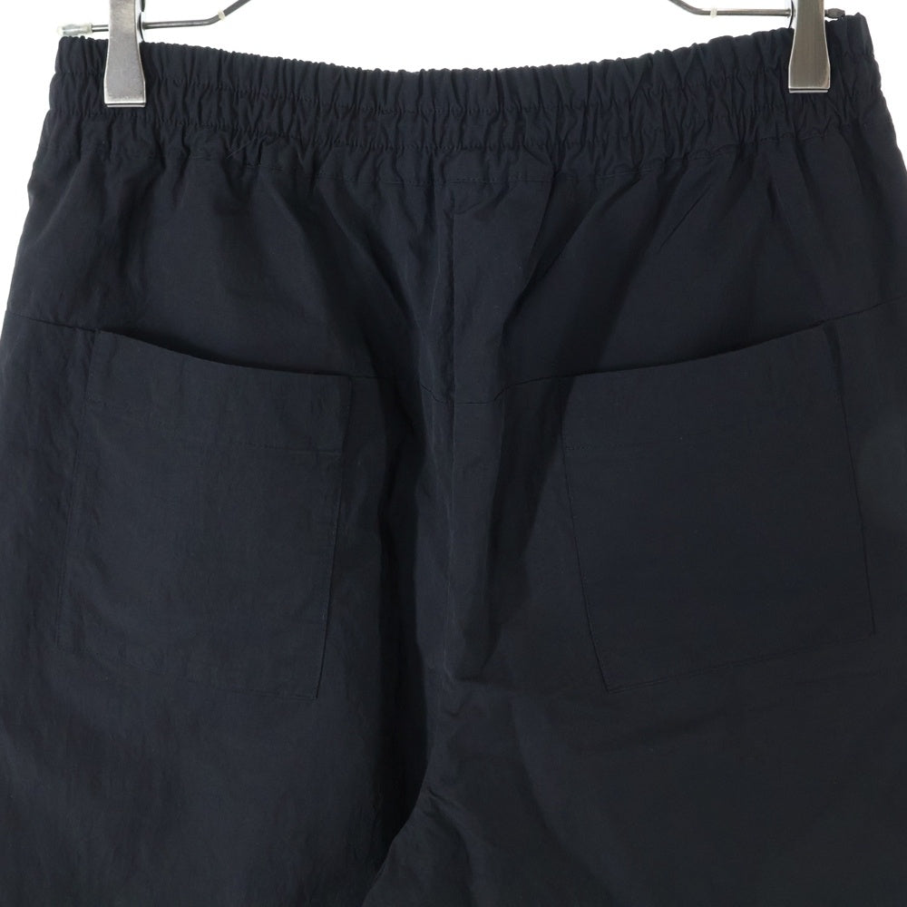 Matin Kim(マーティンキム) サイドロゴ ナイロン フリース切替 トラックパンツ ブラック MK2311PT009M0-BB-S