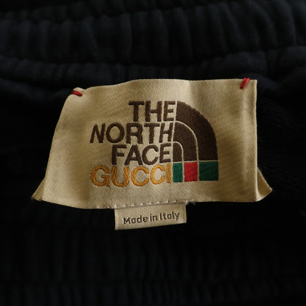 GUCCI(グッチ) 21SS×THE NORTH FACE ザ ノースフェイス サイドシェリーラインロゴプリントスウェットパンツ ブラック 657490 XJDIP