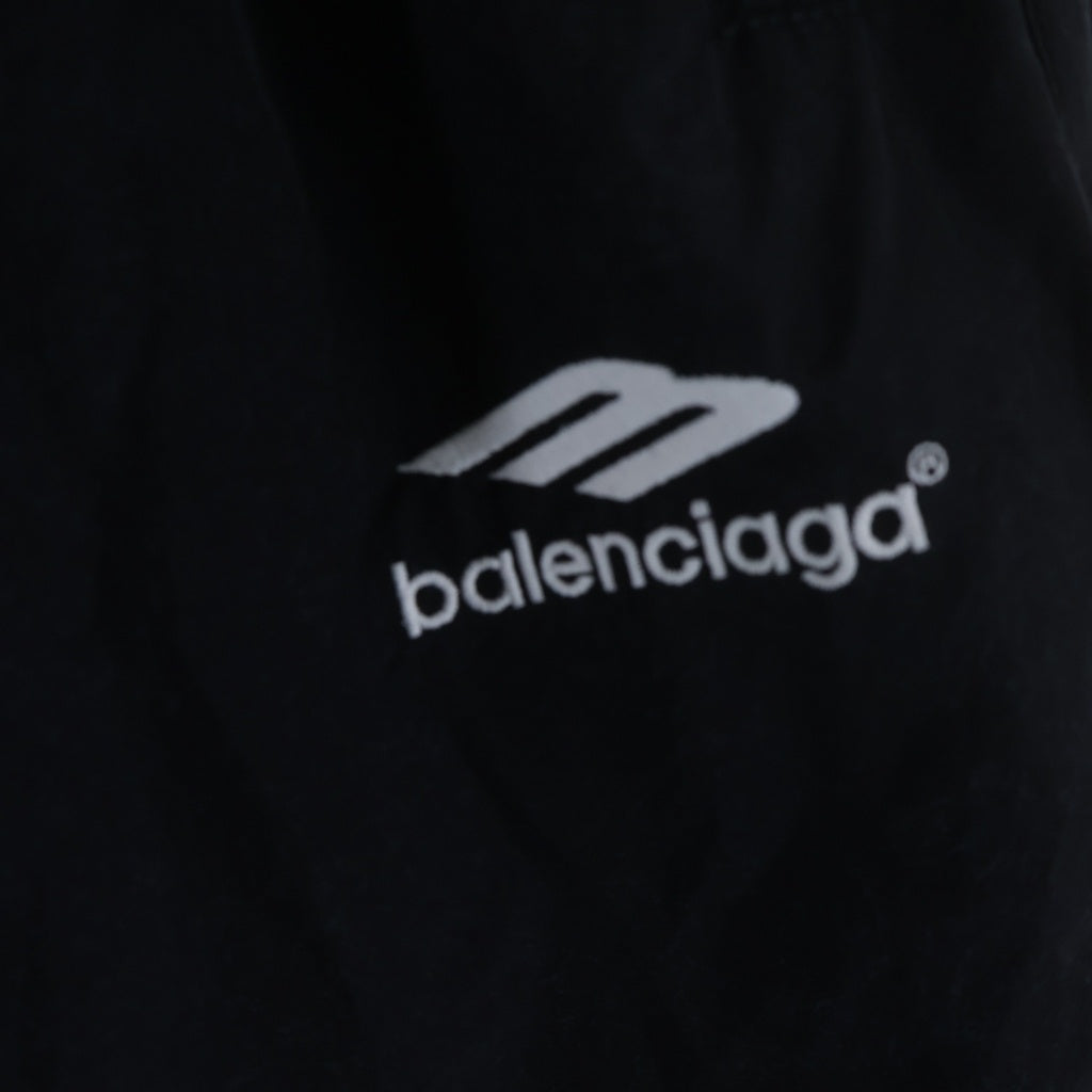 BALENCIAGA(バレンシアガ) 24SS PARIS SOCCER TRACKSUIT ナイロンオーバーサイズロングパンツ ブラック 780874 TPQ38