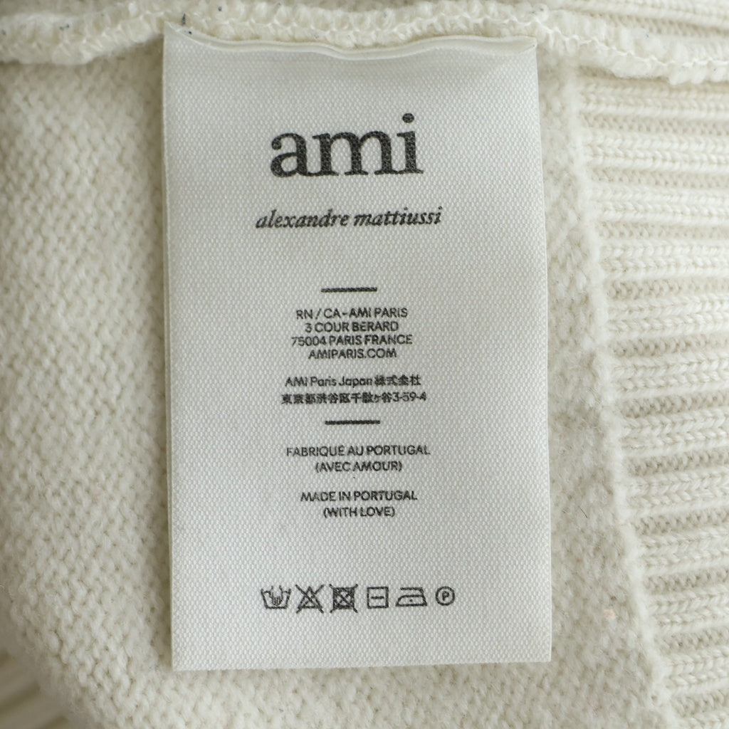 AMI Alexandre Mattiussi(アミアレクサンドルマテュッシ) ハートロゴ クルーネックニット 長袖セーター ホワイト/レッド BFUKS002.018