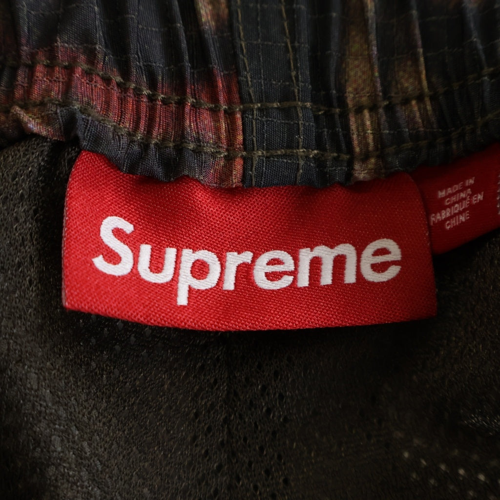 SUPREME(シュプリーム) 25SS Reflective Ripstop Track Pant リフレクティブリップストップ トラックパンツ レッド/ブラウン