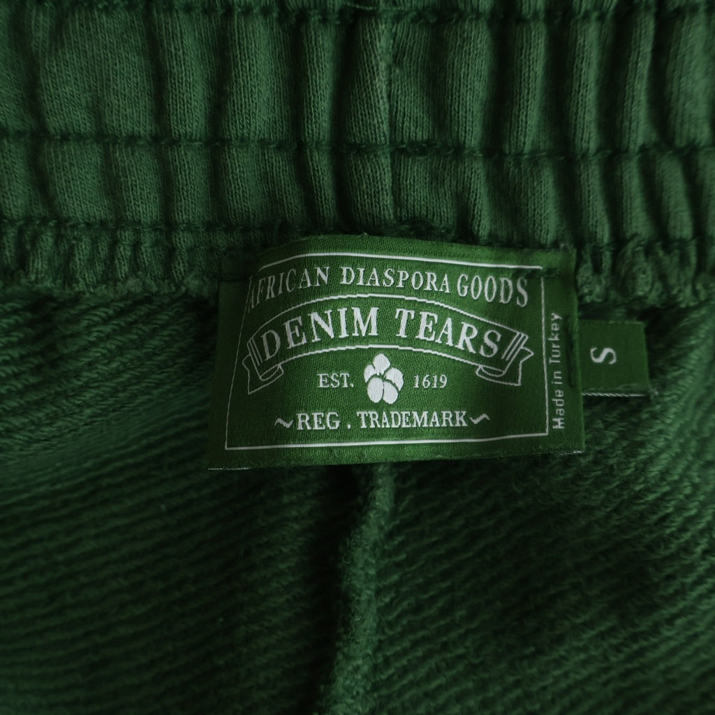 DENIM TEARS(デニムティアーズ) 25AW × Corteiz Island Sweatpants コーテイズ アイランド スウェットパンツ グリーン