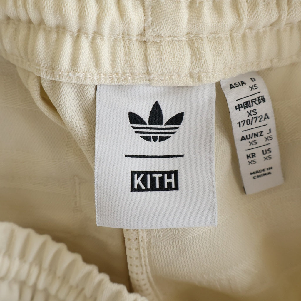 adidas(アディダス) ×KITH キス 総柄 サイド3ライン トラック パンツ ベージュ KA8604