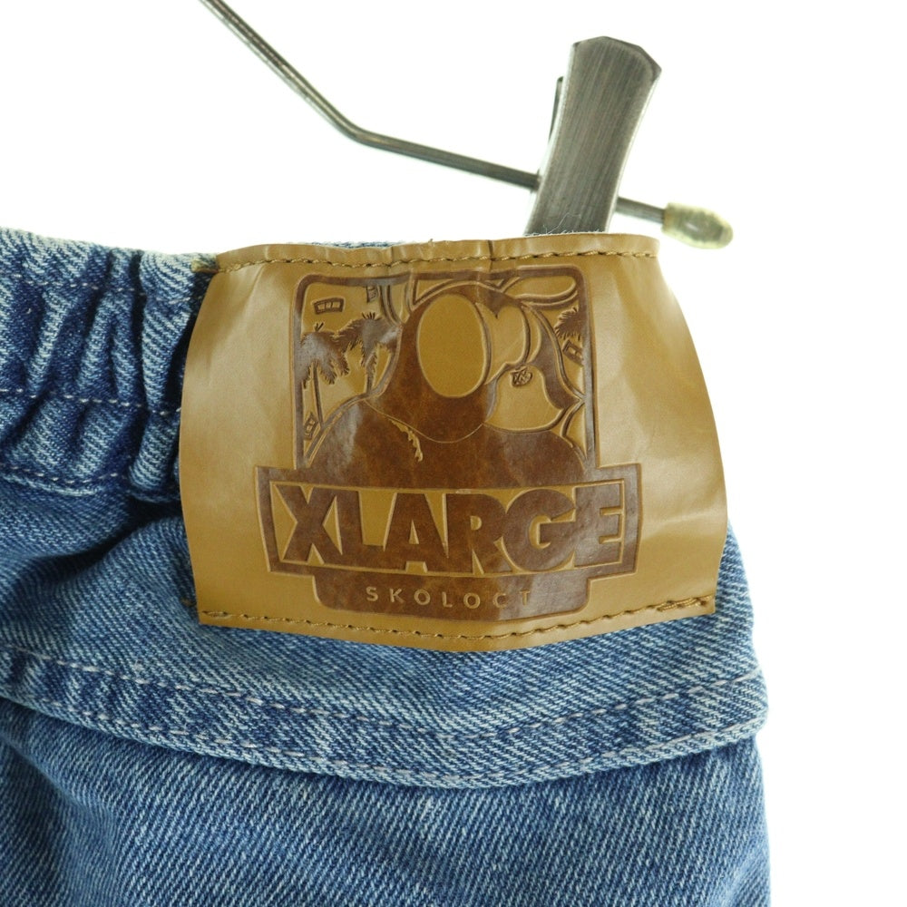 X-LARGE(エクストララージ) 23AW EASY DENIM PANTS ダメージ加工 フロントデザイン イージーデニムパンツ ジーンズ インディゴ 101233031025