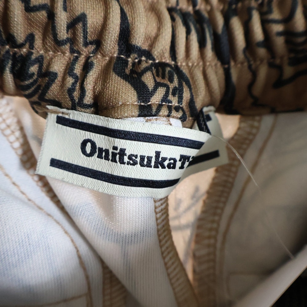 Onitsuka Tiger(オニツカタイガー) Logo Patch TRACK PANTS 2183B518 ロゴパッチ 総柄 トラックパンツ ブラウン/ブラック