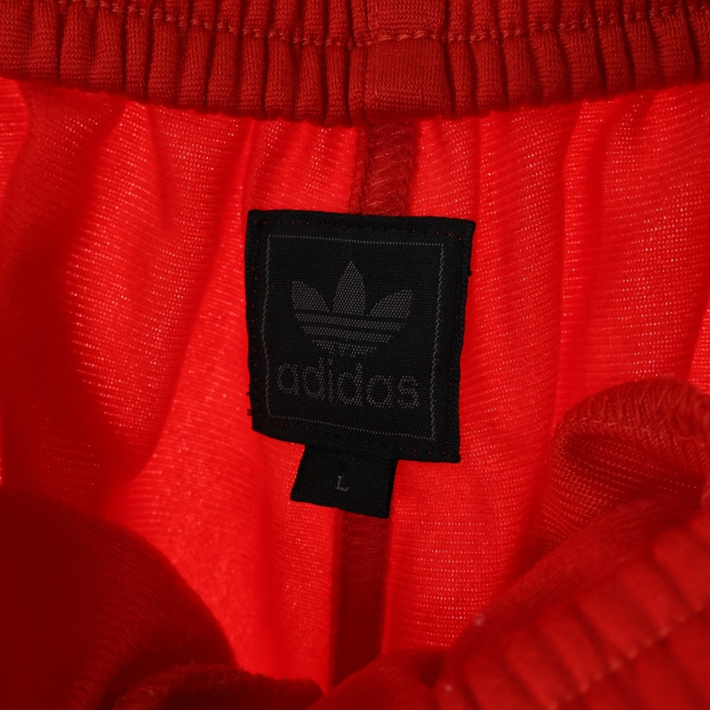 adidas Originals(アディダスオリジナルス) サイドスナップトラックパンツ レッド
