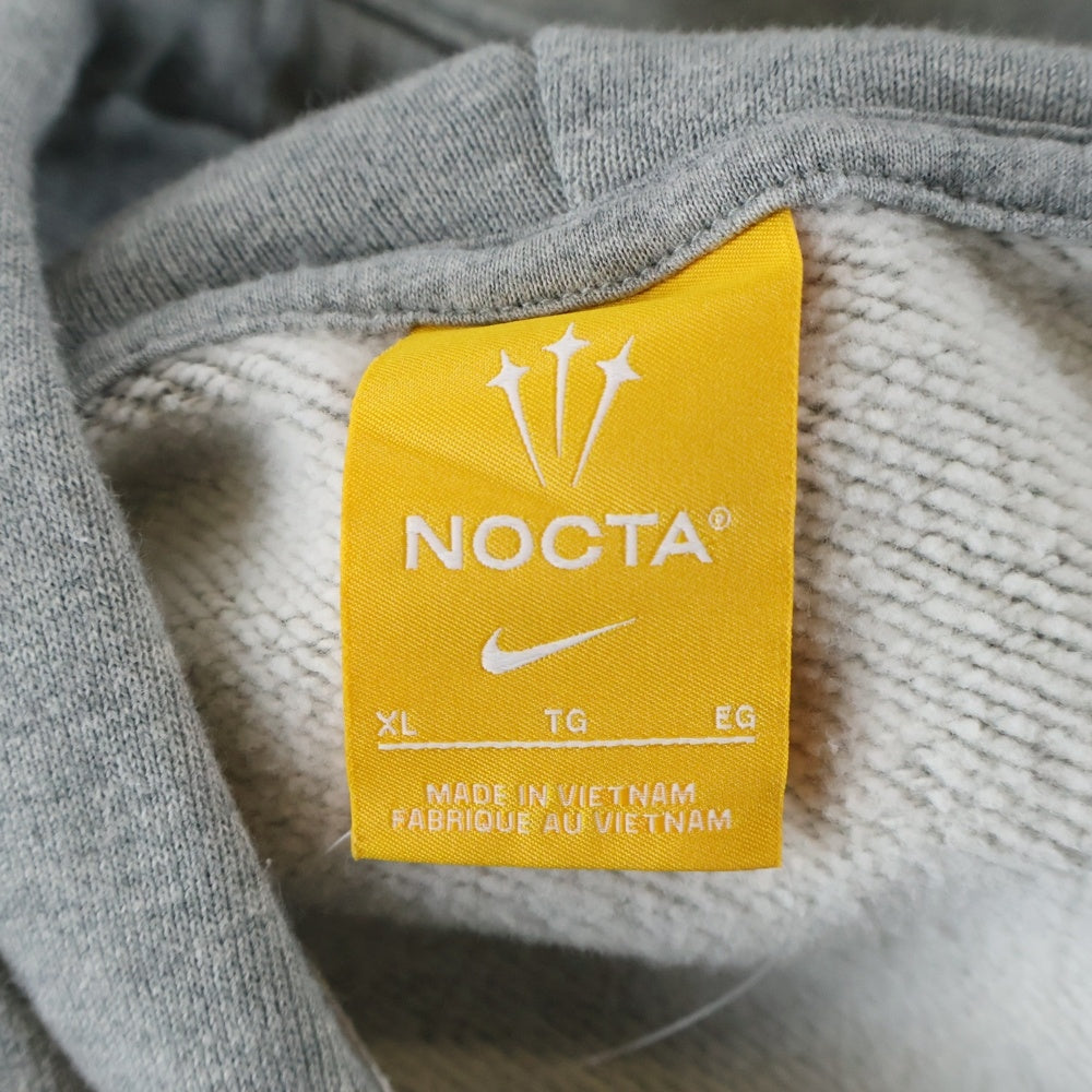 NIKE(ナイキ) NRG NOCTA CS HOODIE FN7659-063 ロゴ フリース プルオーバーパーカー フーディー グレー