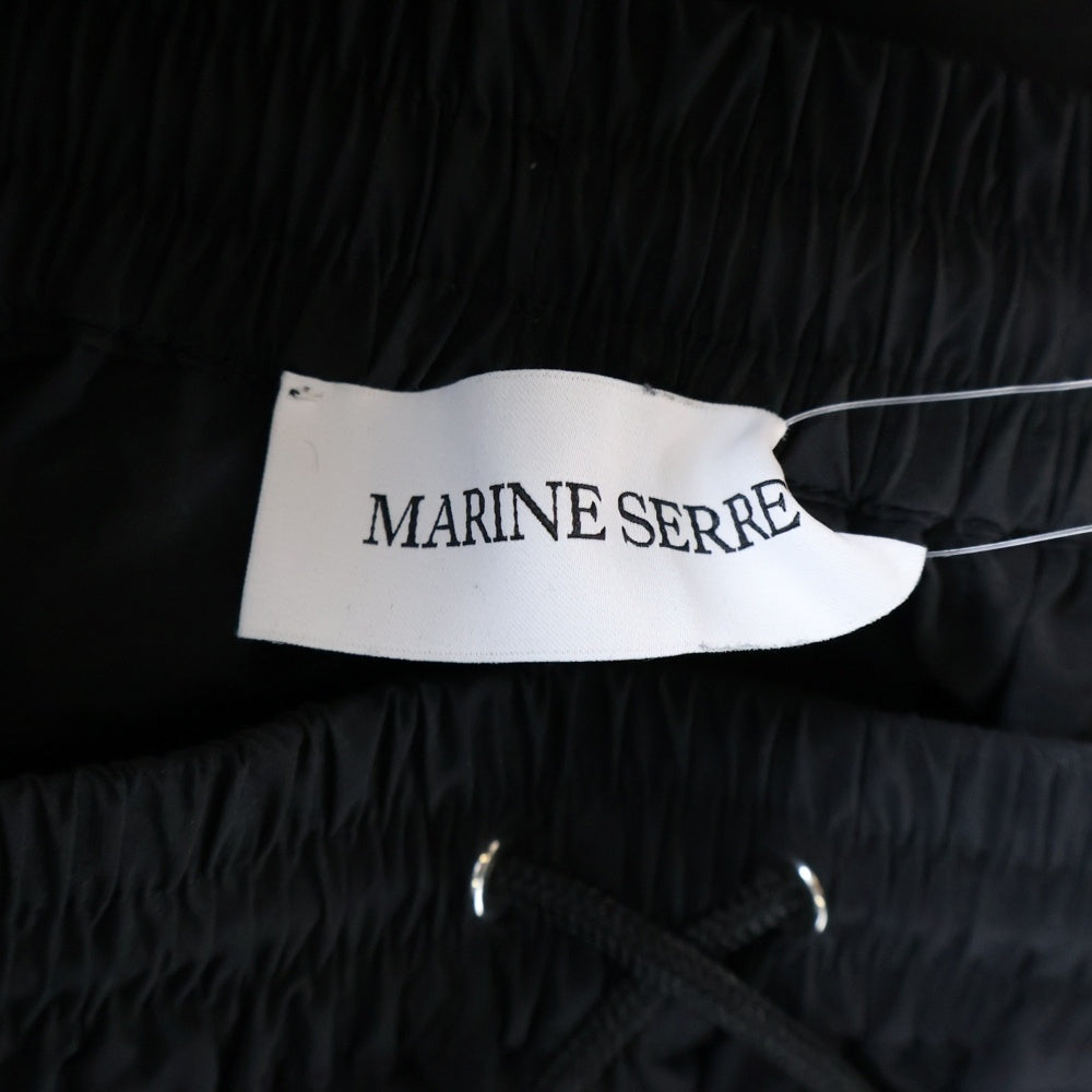 MARINE SERRE(マリーン セル) ロゴ刺繍サイドライン ナイロントラックパンツ ブラック
