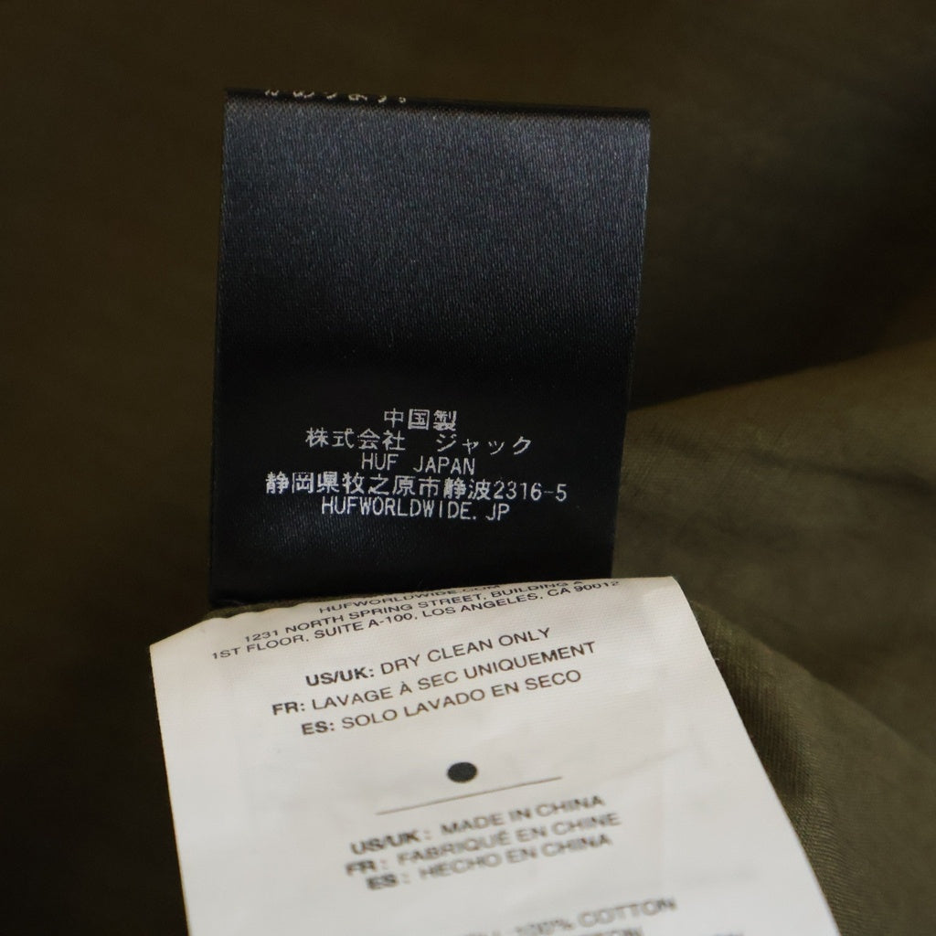 HUF(ハフ) 24AW× THE TEXAS CHAIN SAW MASSACRE M64 MILITARY JACKET FA-JK00462 テキサス チェーンソー 別注 ミリタリー ジャケット カーキ