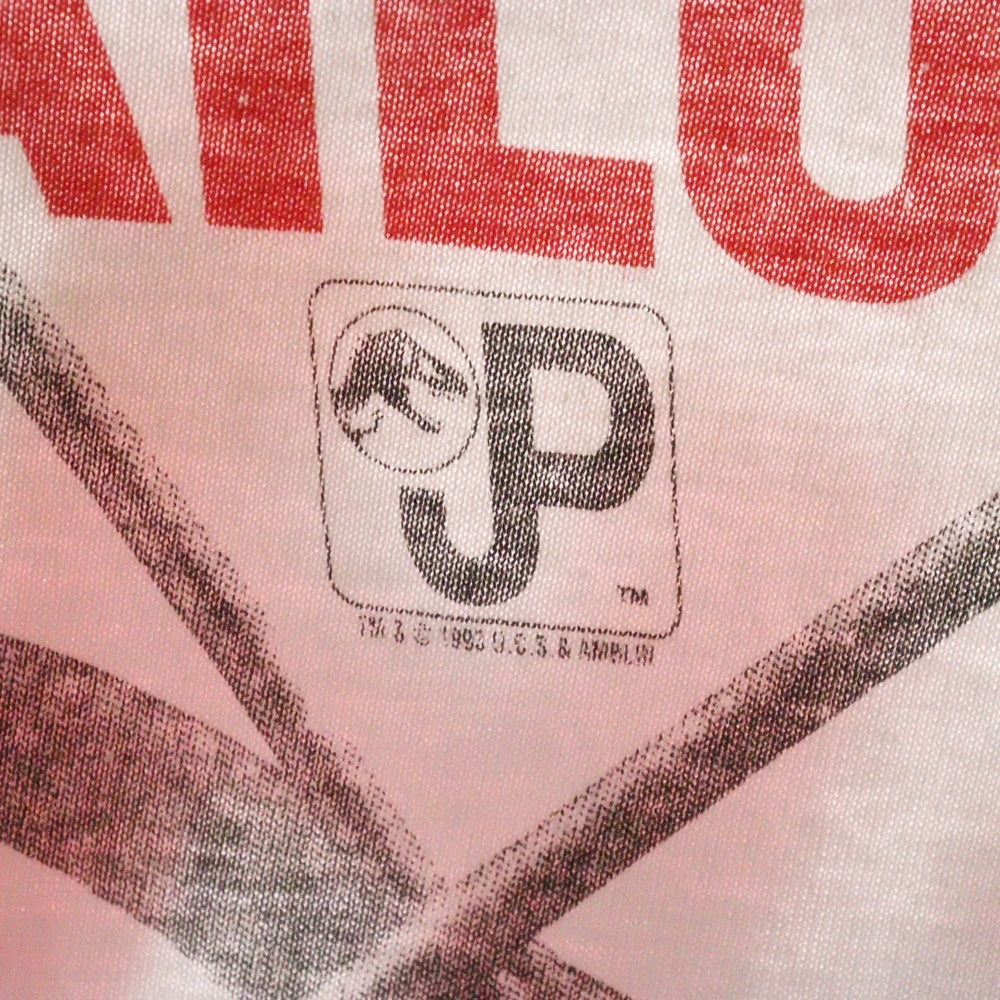 VINTAGE(ヴィンテージ) 90s Jurassic Park Danger ジュラシックパーク 総柄プリント クルーネック 半袖Tシャツ ホワイト