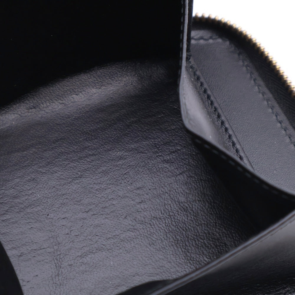COMME des GARCONS(コムデギャルソン) EMBOSSED LOGOTYPE1 エンボスロゴ ジップ ウォレット ブラック SA2100EL