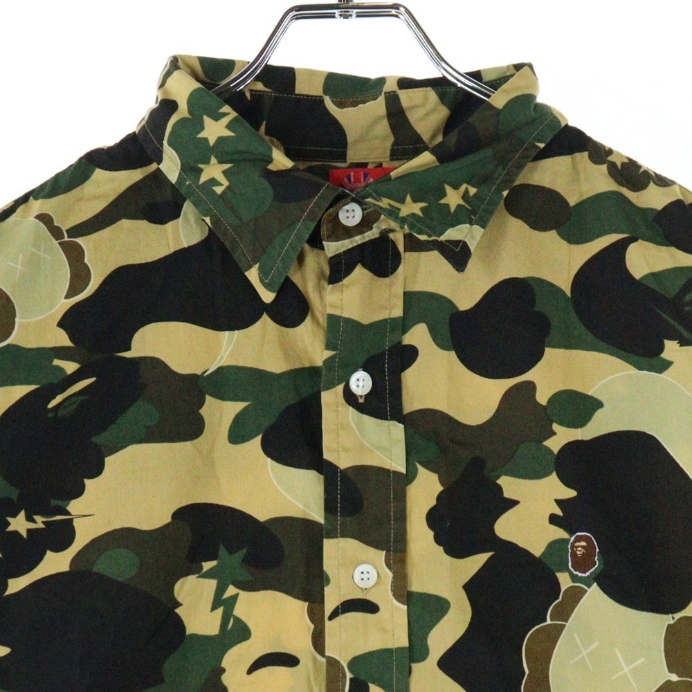 A BATHING APE(アベイシングエイプ) ×KAWS bendy 1st camo yellow S/S SHITS カウズ 迷彩 カモ柄 半袖シャツ マルチカラー