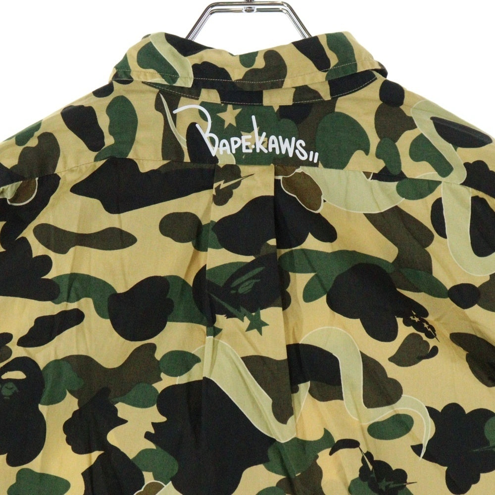 A BATHING APE(アベイシングエイプ) ×KAWS bendy 1st camo yellow S/S SHITS カウズ 迷彩 カモ柄 半袖シャツ マルチカラー