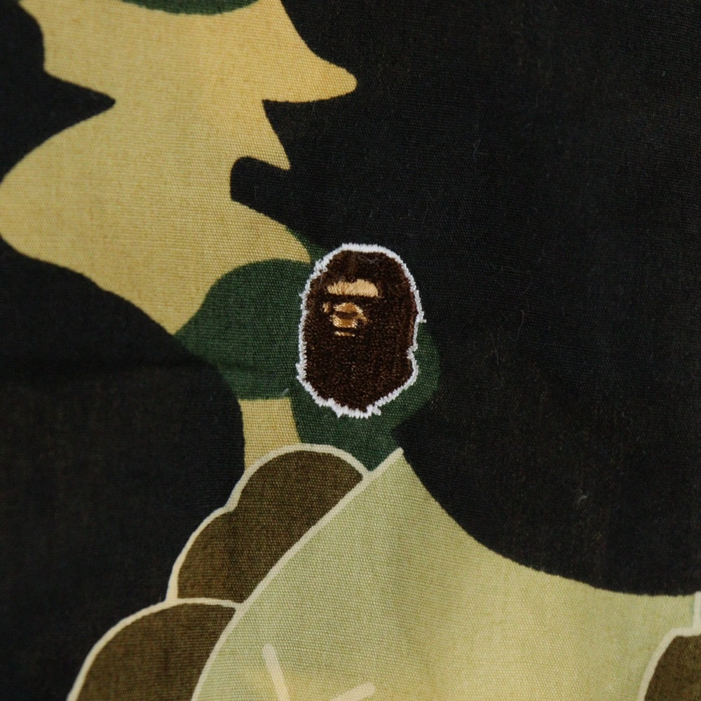 A BATHING APE(アベイシングエイプ) ×KAWS bendy 1st camo yellow S/S SHITS カウズ 迷彩 カモ柄 半袖シャツ マルチカラー