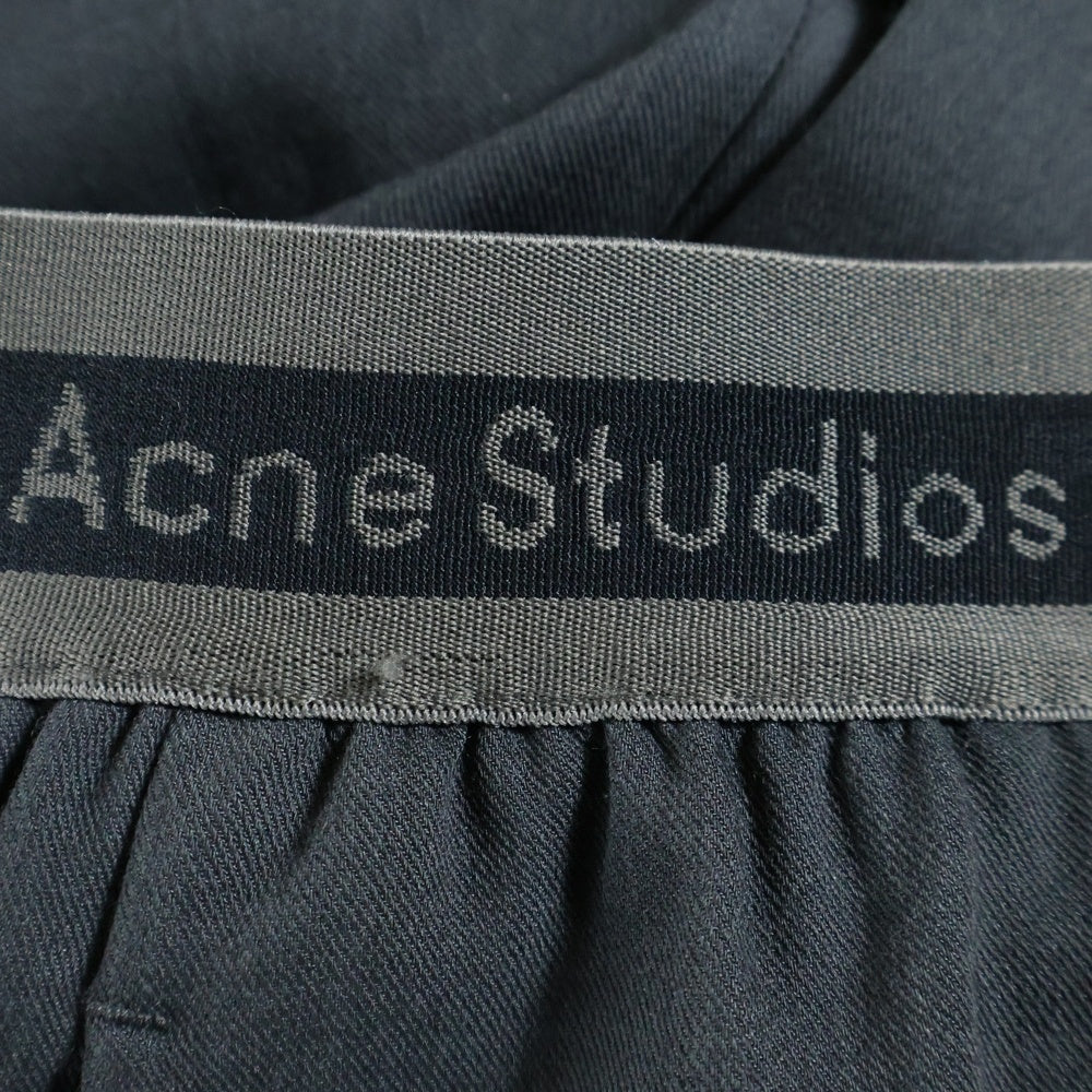 Acne Studios(アクネ ストゥディオズ) LOGO TAPE TROUSERS ロゴテープトラウザーズ イージーワイドパンツ グレー FN-MN-TROU001028
