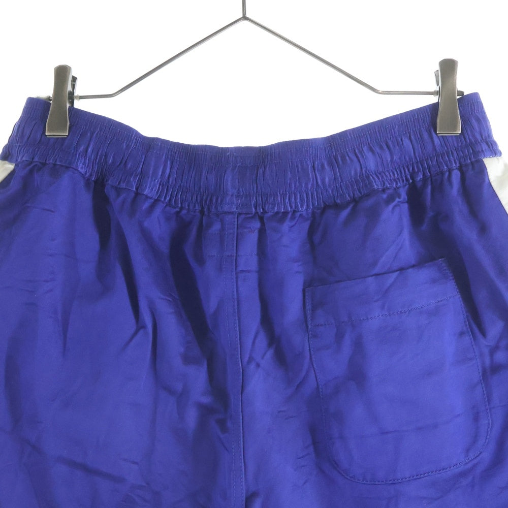 HUMAN MADE(ヒューマンメイド) 25SS GYM SHORTS サイドロゴ ナイロン ハーフパンツ ショーツ ブルー