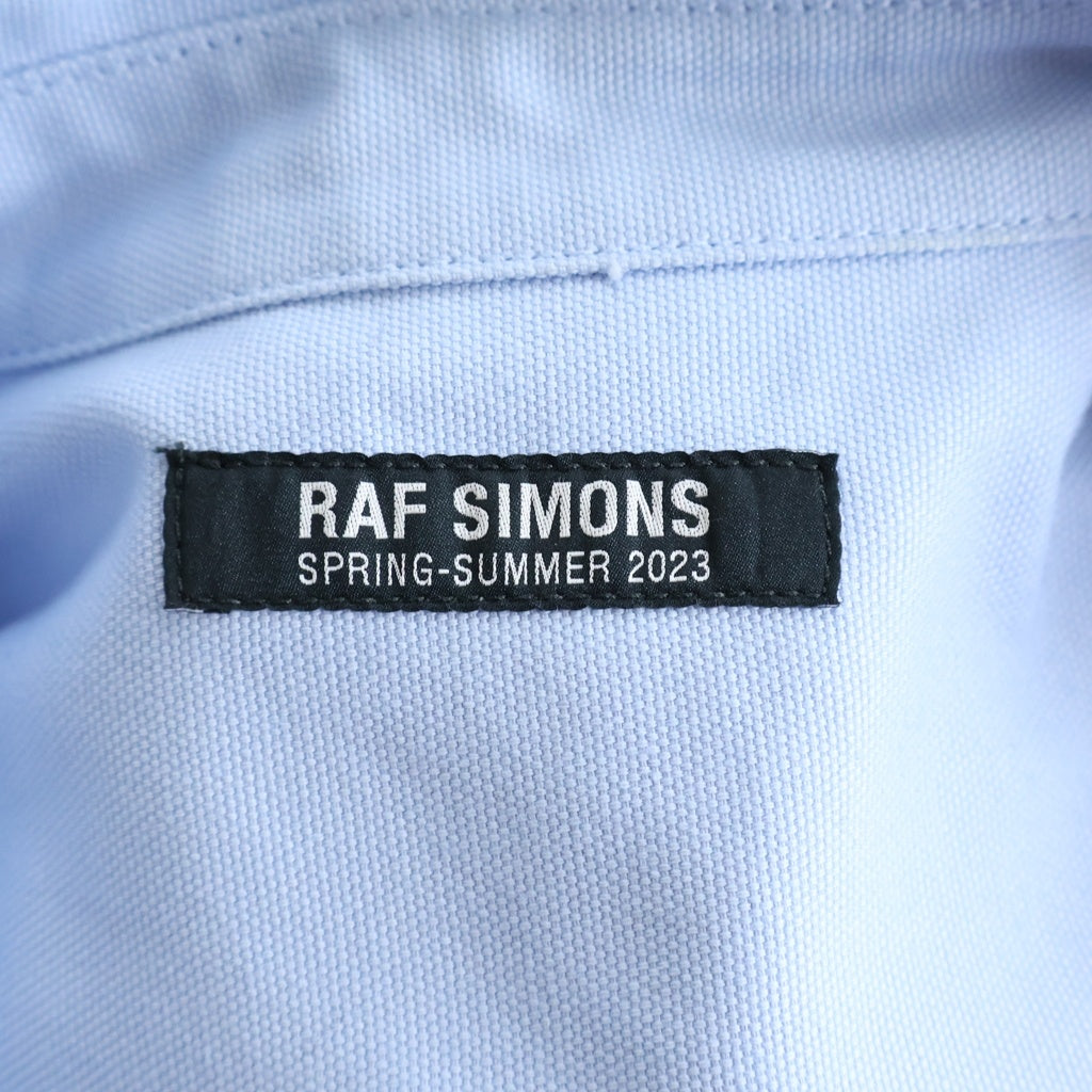 RAF SIMONS(ラフシモンズ) 23SS OVERSIZED DENIM SHIRT WITH LEATHER PATCH ロゴレザーパッチ デニムシャツ ライトブルー 231-M243