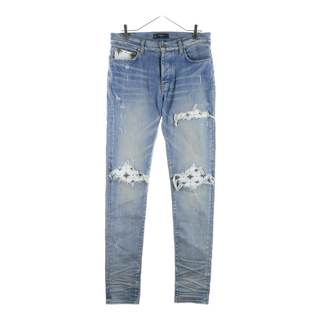 AMIRI(アミリ) ロゴレザーパッチ ダメージ加工 スキニー デニムパンツ ライトブルー J035 J102