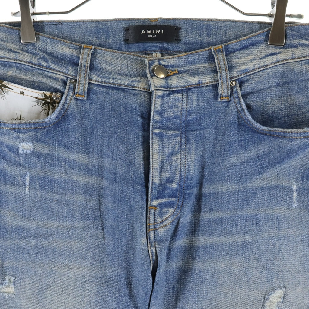 AMIRI(アミリ) ロゴレザーパッチ ダメージ加工 スキニー デニムパンツ ライトブルー J035 J102