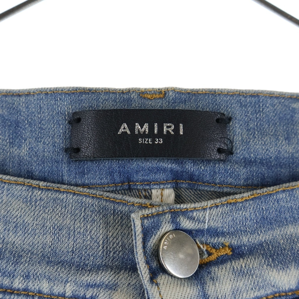 AMIRI(アミリ) ロゴレザーパッチ ダメージ加工 スキニー デニムパンツ ライトブルー J035 J102
