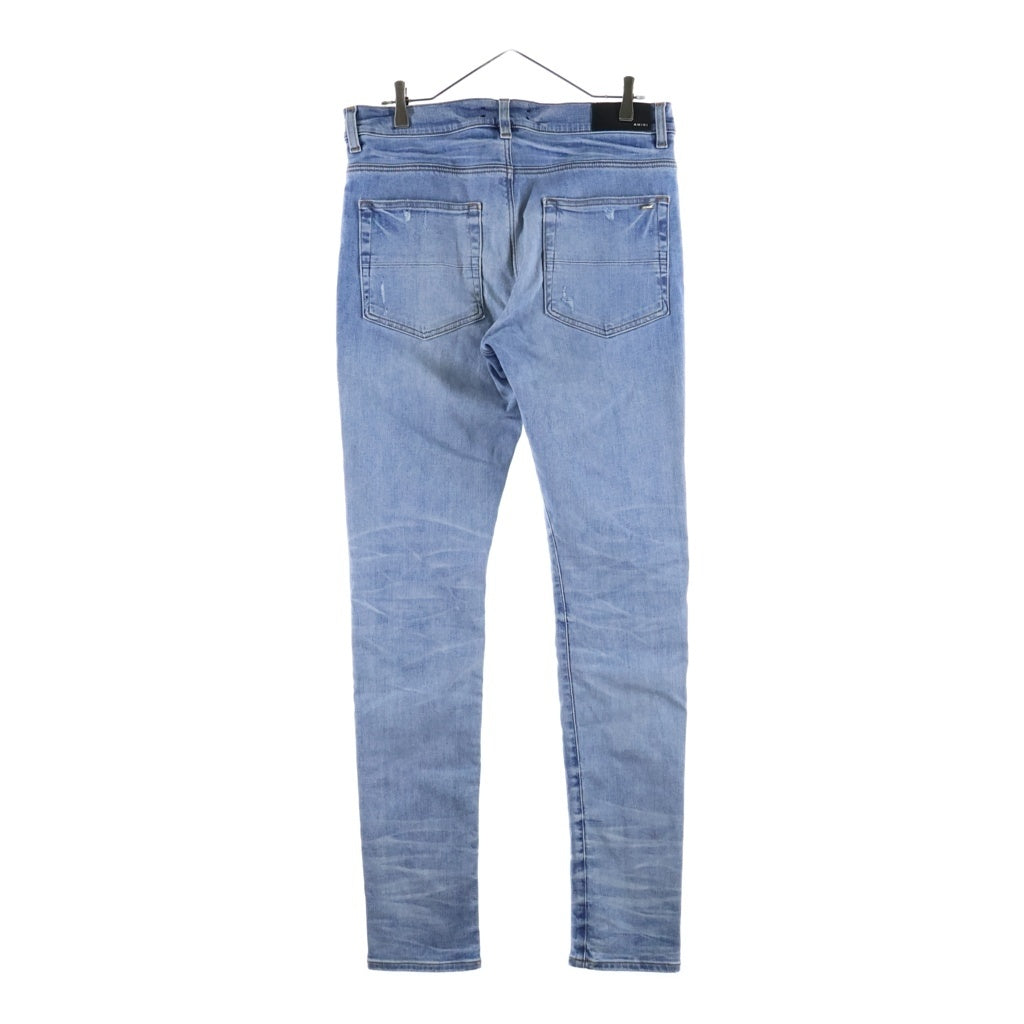 AMIRI(アミリ) マイクロスターバースト ロゴレザーパッチ ダメージ加工 スキニー デニムパンツ インディゴ J035 J102