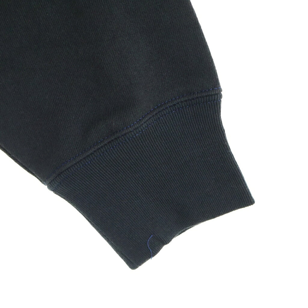 TALKING ABOUT THE ABSTRACTION(トーキング アバウト ザ アブストラクション) CROSS P/W PARKA クロスパッチ コットン プルオーバーパーカー ブラック 2526AW-PK-003