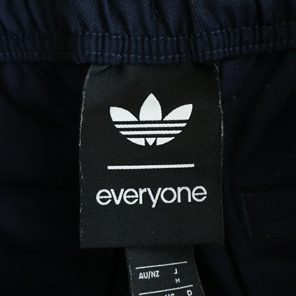adidas(アディダス) × everyone エブリワン ロゴ刺繍 サイドライン ジャージー トラックパンツ ネイビー A6A001