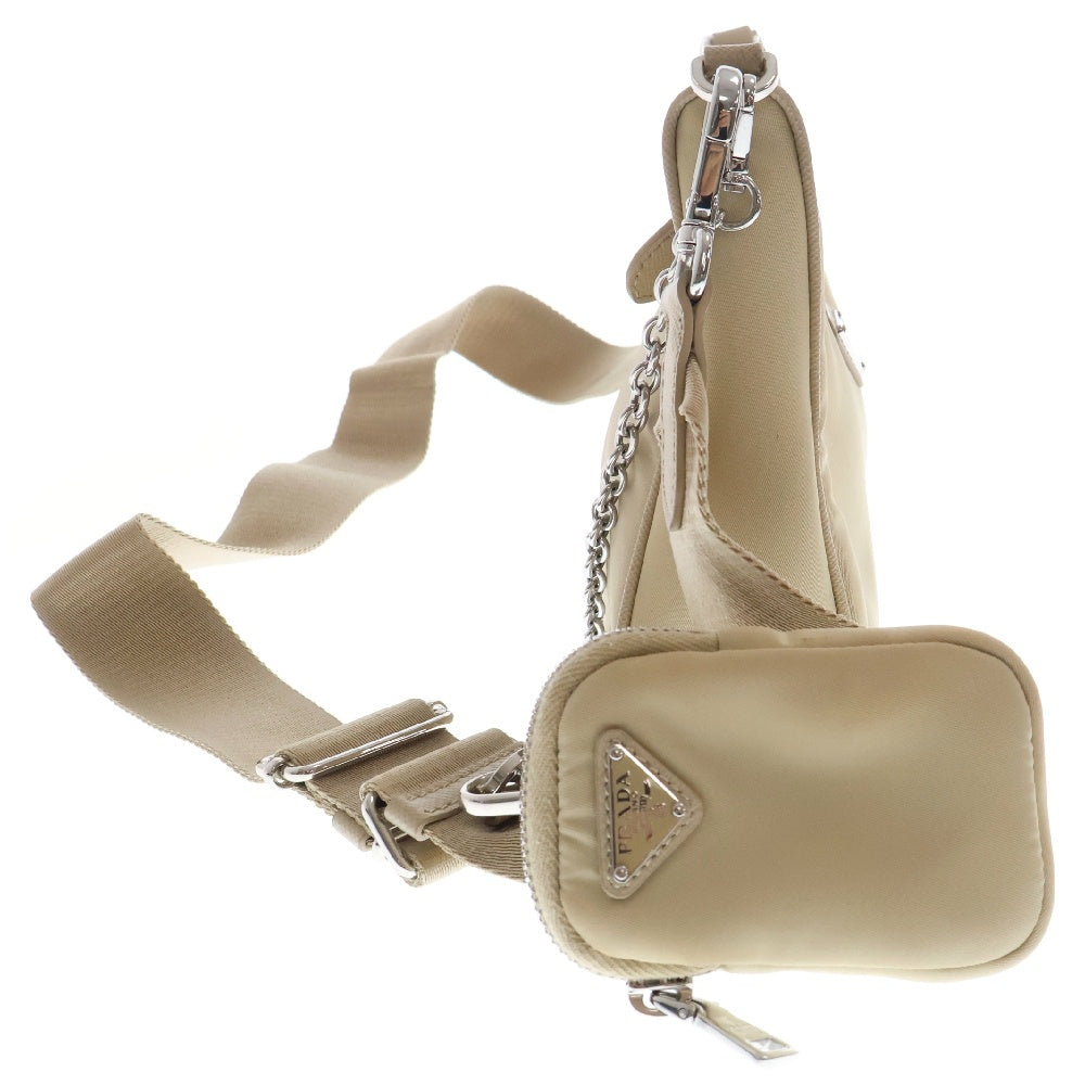 PRADA(プラダ) Re-Edition 2005 ショルダーバッグ ベージュ シルバー金具 1BH204 ミニバッグ チェーンバッグ 三角ロゴプレート