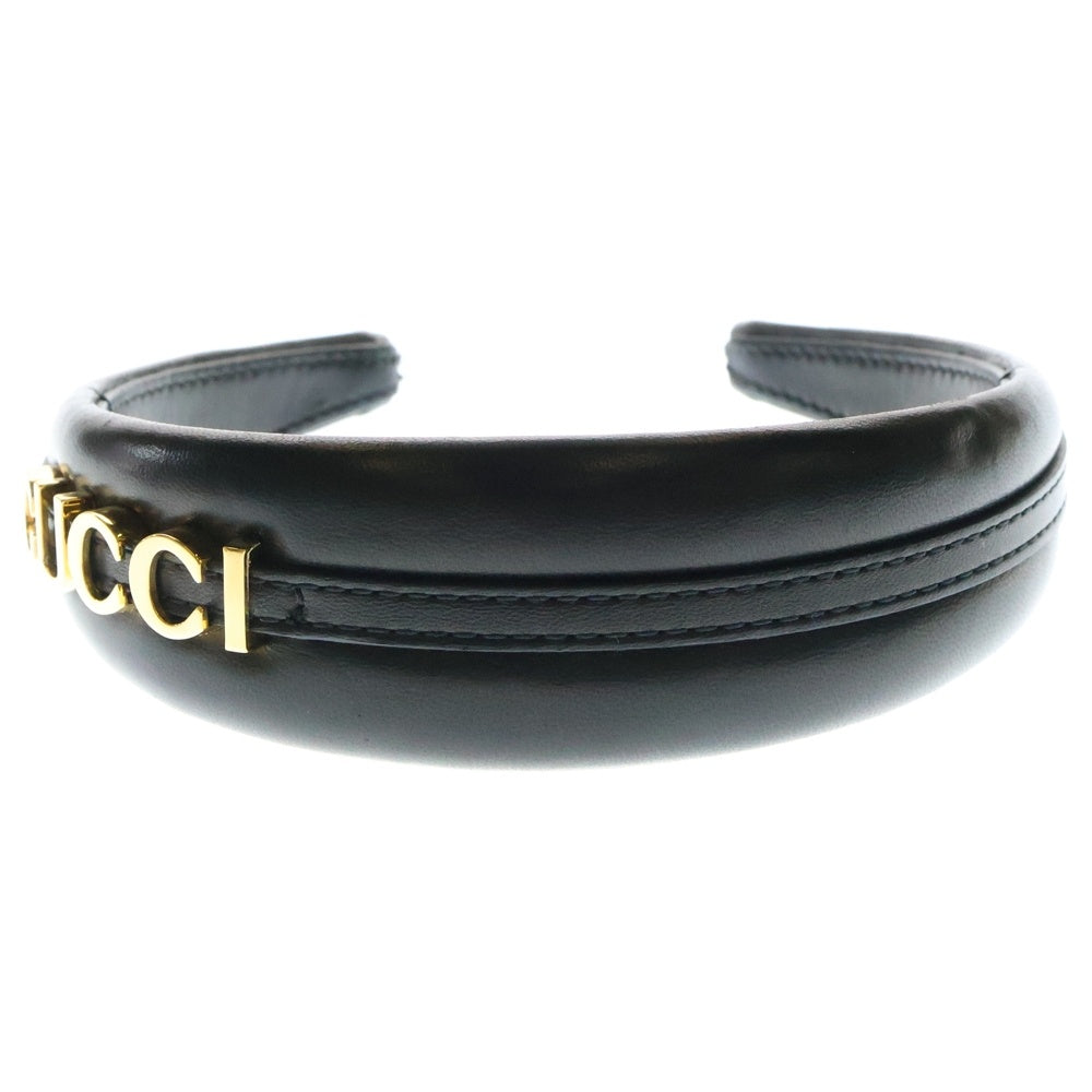 GUCCI(グッチ) ロゴプレート レザー カチューシャ ヘアバンド ブラック/ゴールド レディース 769249