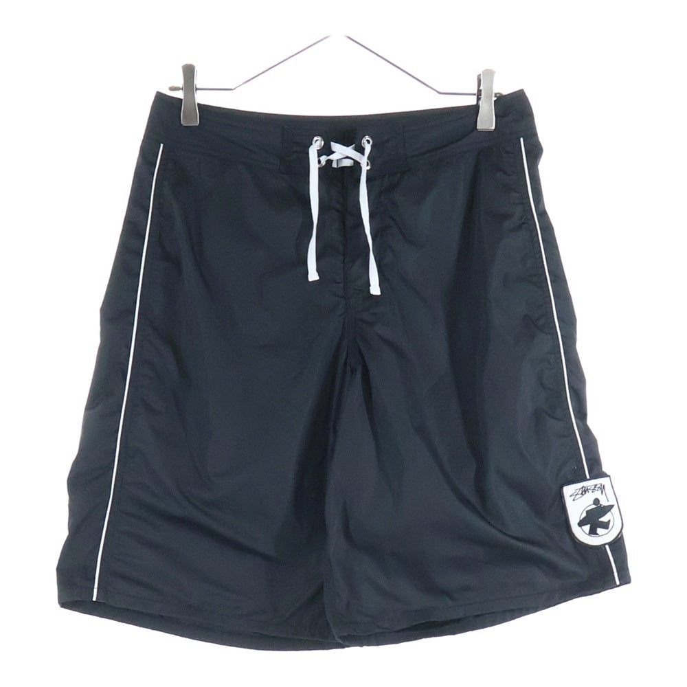 STUSSY(ステューシー) サーフマン ロゴ刺繍 ナイロン ハーフ ショートパンツ ショーツ ブラック
