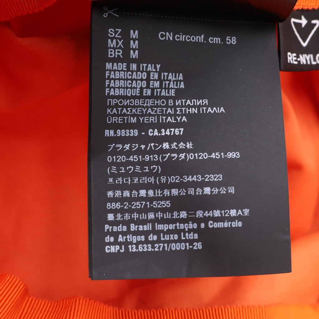 PRADA(プラダ) ロゴ三角プレート バケットハット 帽子 オレンジ ナイロン #M レディース