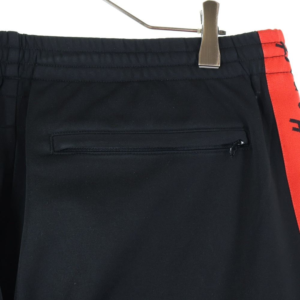 HUMAN MADE(ヒューマンメイド) サイドロゴデザイン トラックパンツ ストレートパンツ ブラック/レッド