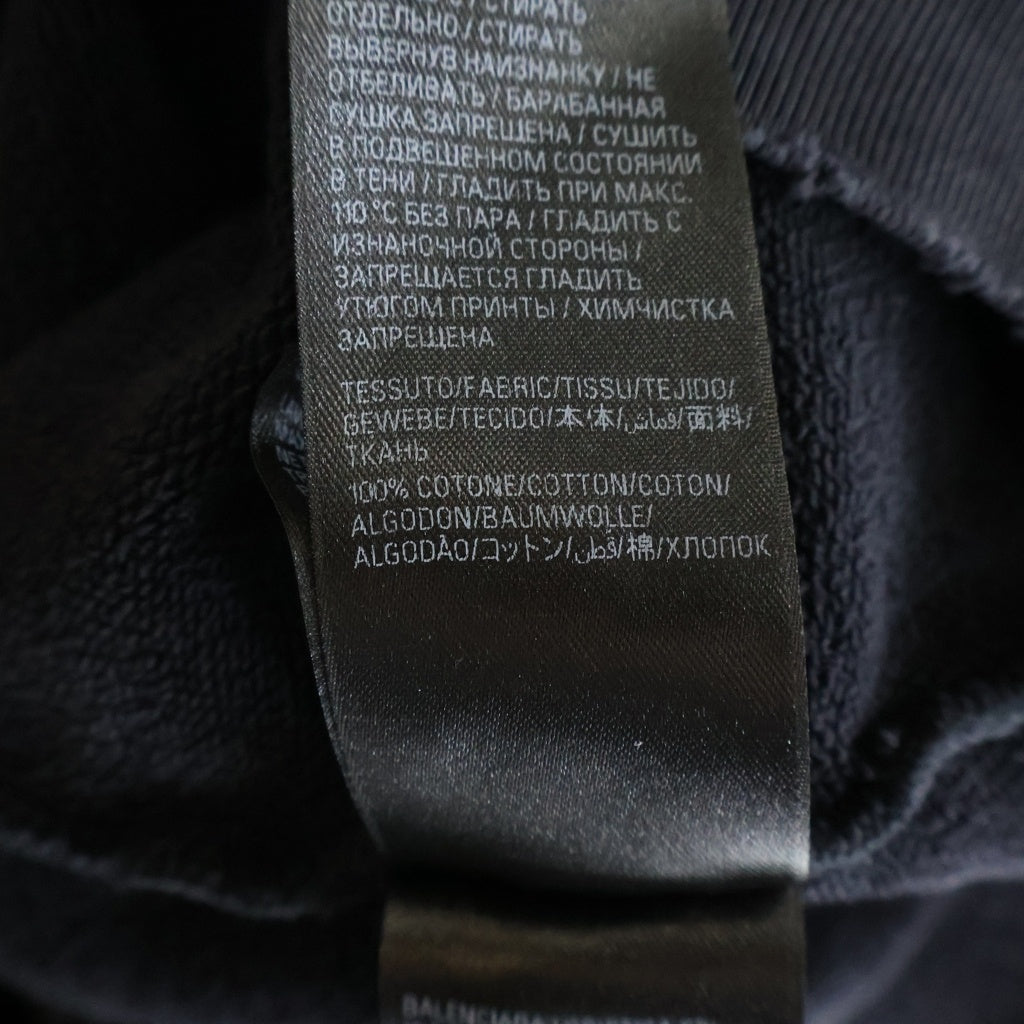 BALENCIAGA(バレンシアガ) 25SS ダメージ加工ロゴ プルオーバーパーカー ブラック 803265 TRVS9