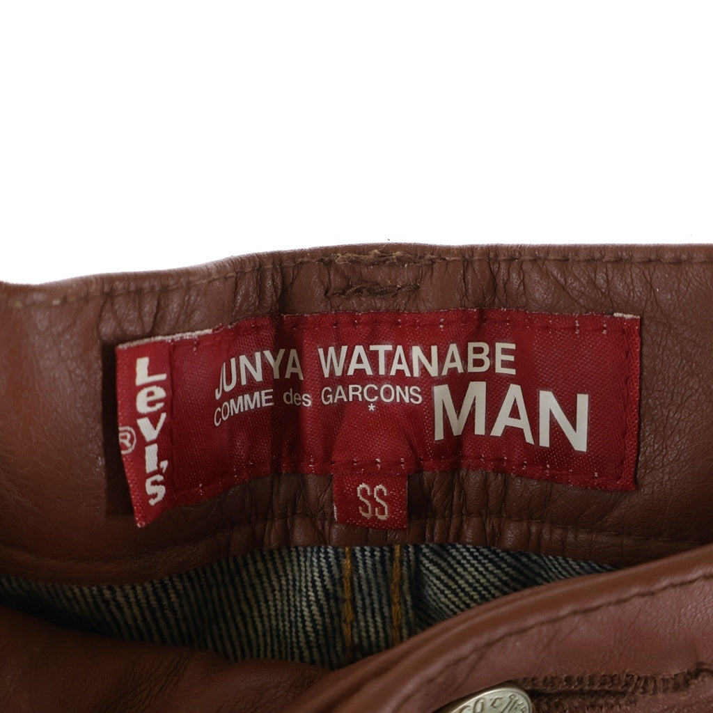 COMME des GARCONS JUNYA WATANABE MAN(コムデギャルソンジュンヤワタナベマン) × Levi's レザー切り替え デニムパンツ フレアパンツ インディゴ/ブラウン WC-O203
